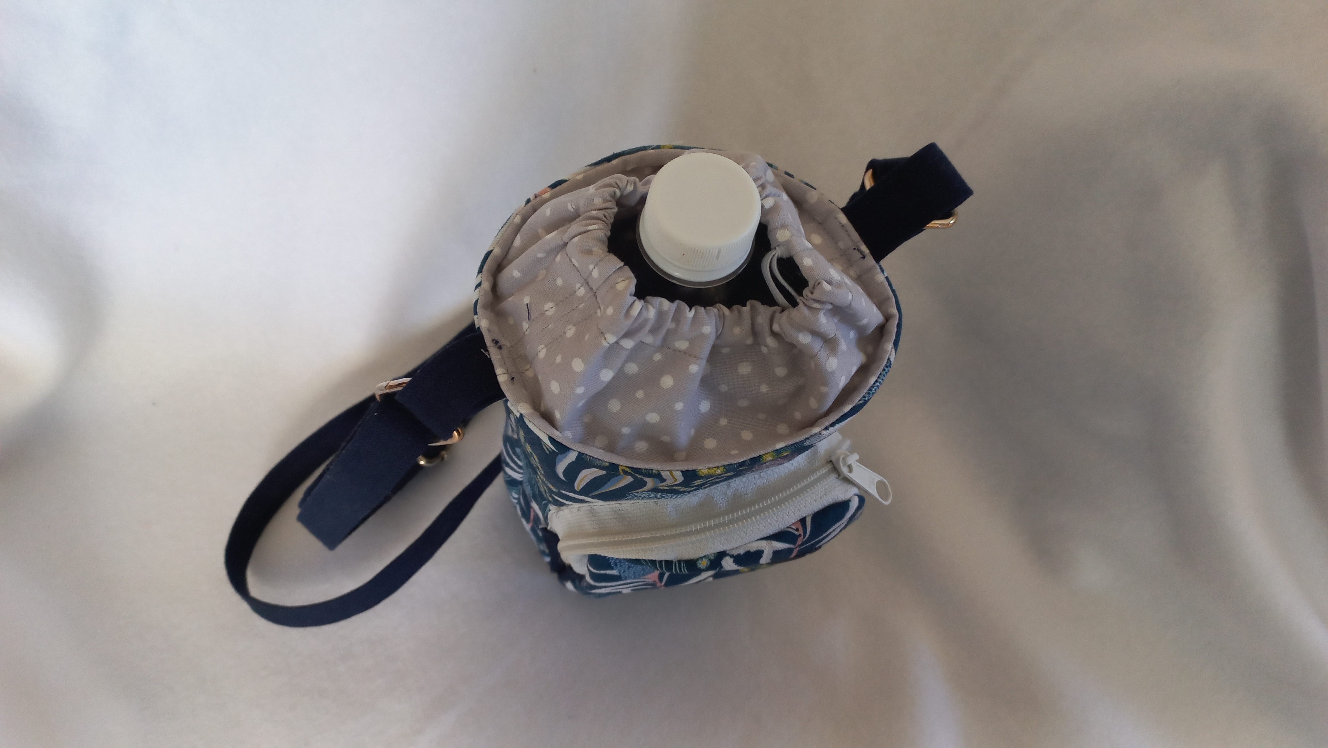 Wanda, water bottle & mobile phone