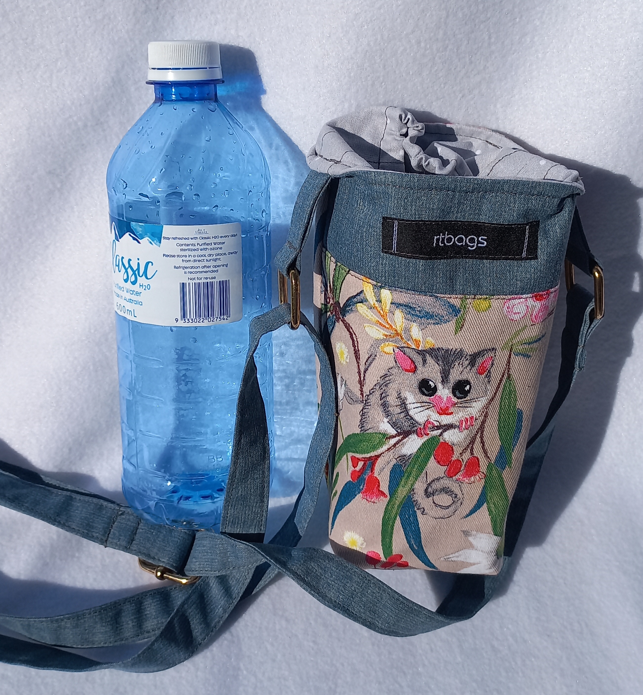 Wanda, water bottle, adjustable strap
