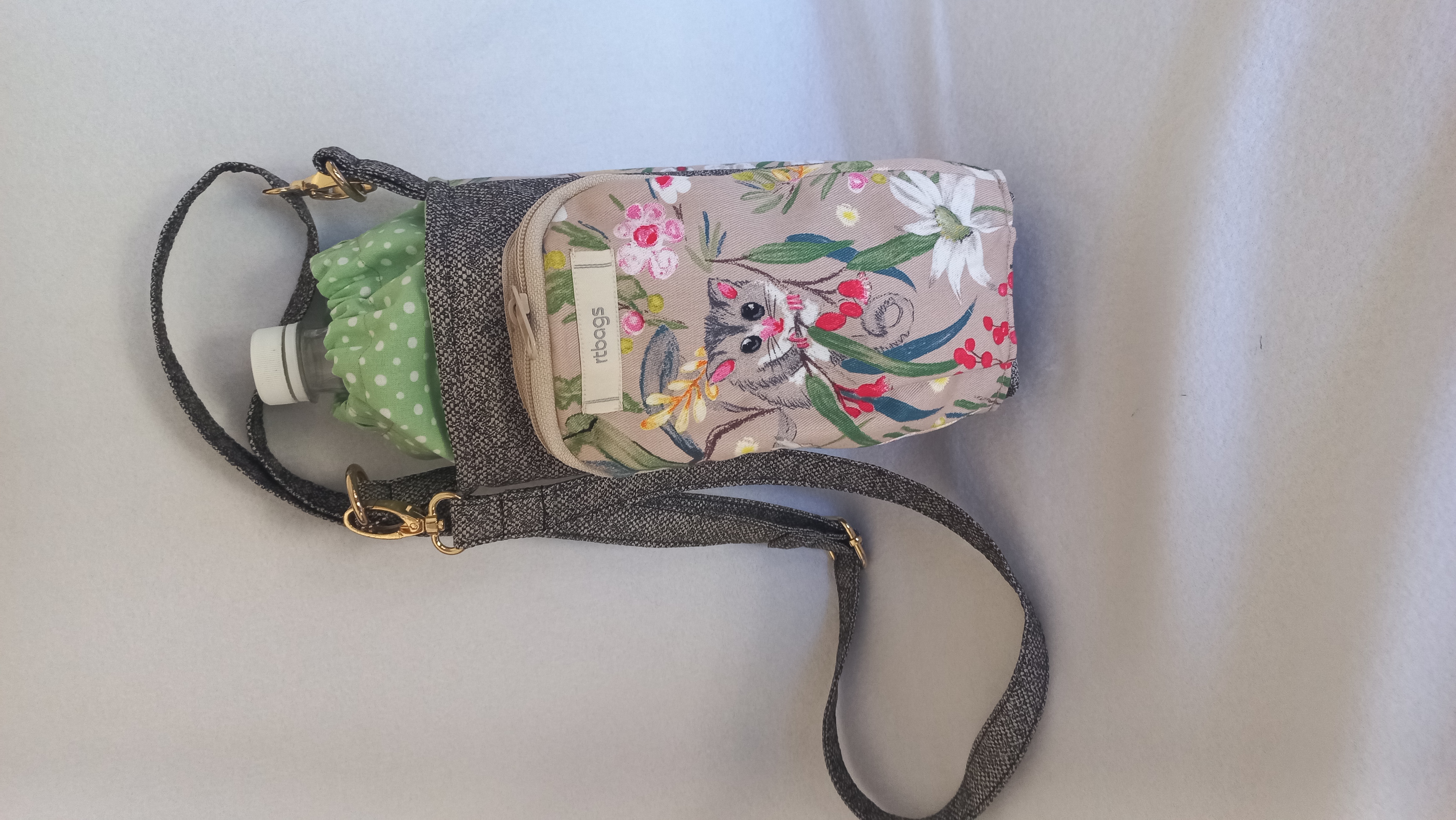 Wanda, water bottle & mobile phone