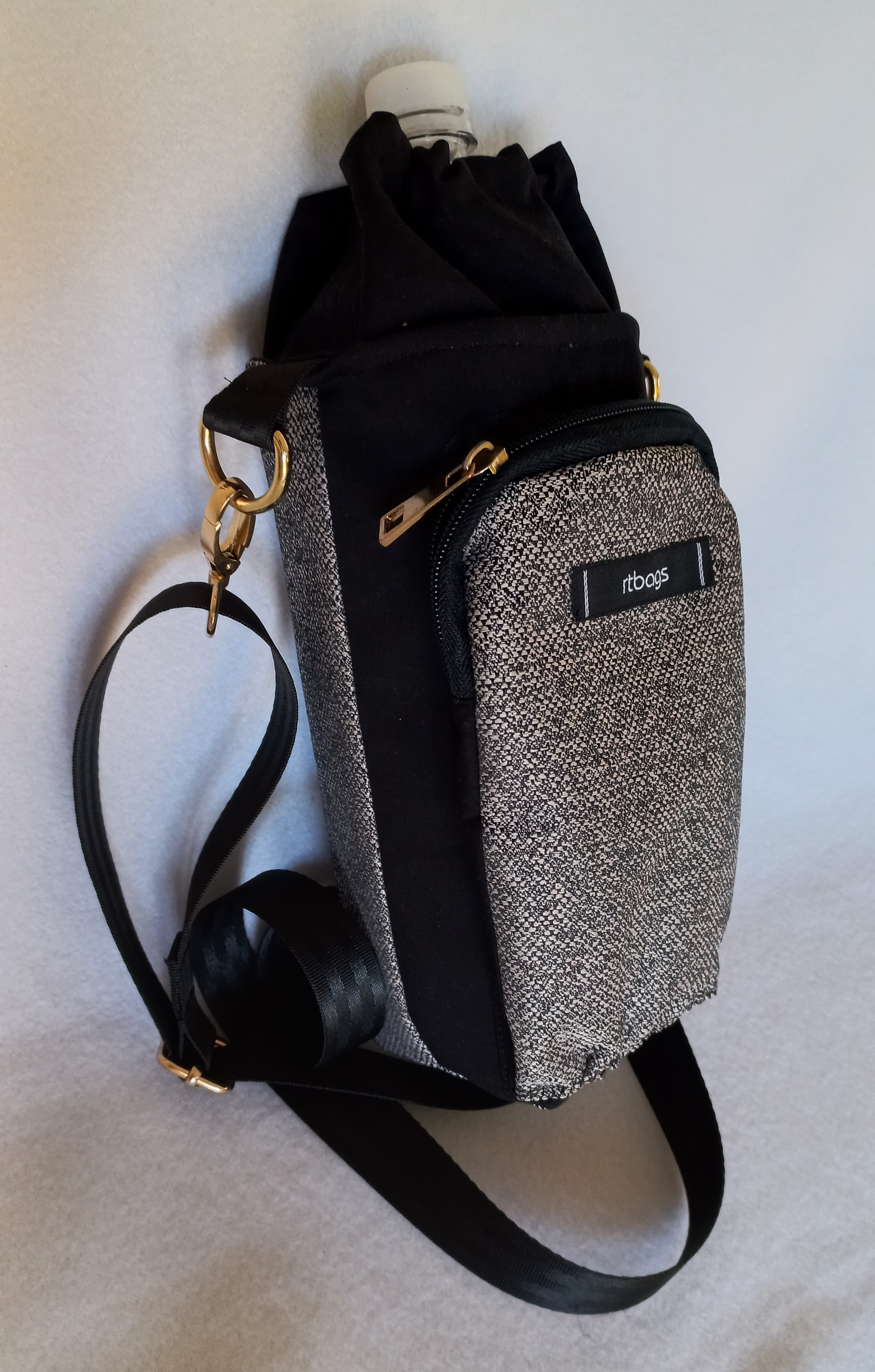 Wanda, water bottle & mobile phone