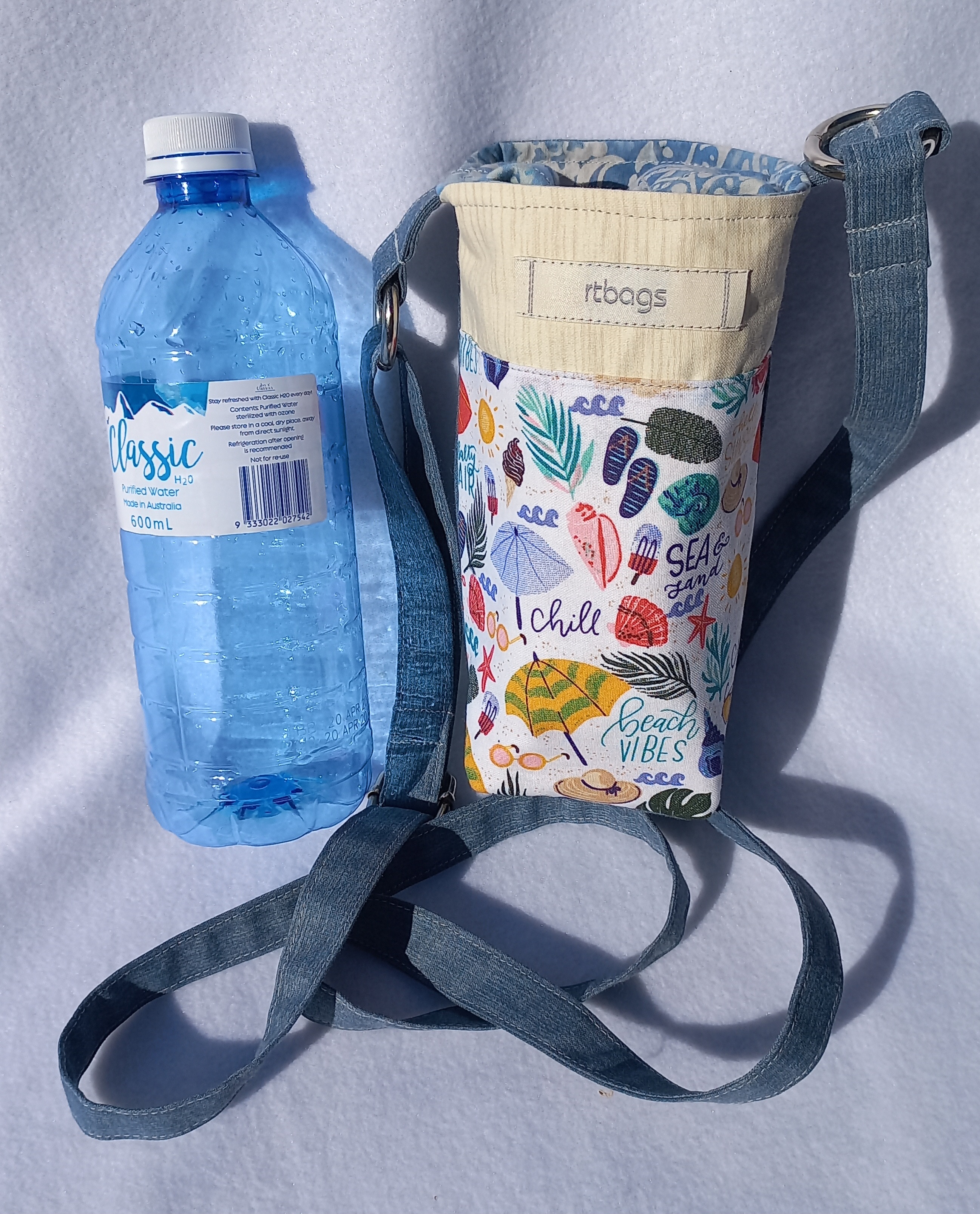Wanda, water bottle, adjustable strap